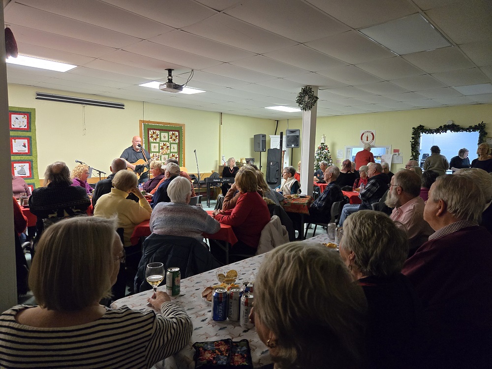On Wednesday, December 4th, a social evening was held in St. Luke's Parish Hall, sponsored by the Outreach Mission Group and organized by Clair MacInnis. Admission was by donation with all proceeds going to the Hubbards Food Bank. There was also a silent auction of donated items with those proceeds going to other outreach projects. Great music was provided by Peter Grant and friends, Shaun Richards, Mike Purdy, Gloria Butler and Glenda Joy who gave generously of their time and talent. A great time was had by everyone in the capacity crowd.